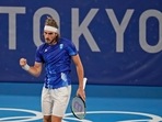 Stefanos Tsitsipas, of Greece, reacts after defeating Frances Tiafoe, of the United States, during the second round of the tennis competition at the 2020 Summer Olympics, Tuesday, July 27, 2021, in Tokyo, Japan.(AP) Stefanos Tsitsipas, of Greece, reacts after defeating Frances Tiafoe, of the United States, during the second round of the tennis competition at the 2020 Summer Olympics, Tuesday, July 27, 2021, in Tokyo, Japan.(AP)