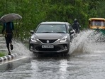 “Morning rain was of high intensity so a few areas of the city witnessed waterlogging. Our field staff is on the ground and we are closely observing the situation,” a PWD official said. Here are a few visuals of waterlogging in parts of Delhi-NCR on Tuesday morning.(Prakash Singh/AFP)