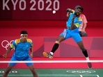 India's Satwiksairaj Rankireddy and Chirag Shetty play against Britain's Ben Lane and Sean Vendy during their men's doubles group play stage badminton match at the 2020 Summer Olympics. 