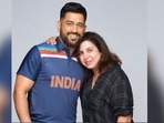 Former India captain MS Dhoni (L) with filmmaker Farah Khan during an ad shoot