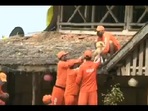 The image shows NDRF personnel rescuing the dog from the flood-hit Shiroli area in Maharashtra.(Twitter/@ANI) The image shows NDRF personnel rescuing the dog from the flood-hit Shiroli area in Maharashtra.(Twitter/@ANI)