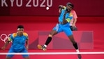 India's Satwiksairaj Rankireddy and Chirag Shetty play against Britain's Ben Lane and Sean Vendy during their men's doubles group play stage badminton match at the 2020 Summer Olympics. (AP) India's Satwiksairaj Rankireddy and Chirag Shetty play against Britain's Ben Lane and Sean Vendy during their men's doubles group play stage badminton match at the 2020 Summer Olympics. (AP)