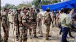 Security personnel at a polling station in Sitalkuchi after clashes erupted between locals and central forces in Cooch Behar district of West Bengal on April 10. (File photo) Security personnel at a polling station in Sitalkuchi after clashes erupted between locals and central forces in Cooch Behar district of West Bengal on April 10. (File photo)
