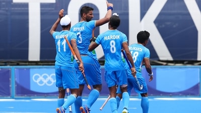 Tokyo 2020 Olympics - Hockey - Men's Pool A - India v Spain - Oi Hockey Stadium, Tokyo, Japan - July 27, 2021. Rupinder Pal Singh of India celebrates with teammates after scoring. REUTERS/Bernadett Szabo (REUTERS)