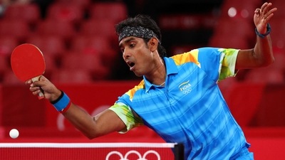 Olympics: I almost had him- Sharath Kamal (in frame) on pushing mighty Ma Long of China to limit in his 'best' tournament ever. (REUTERS)