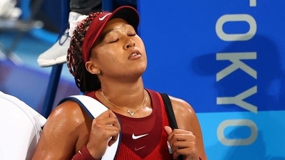 Tokyo 2020 Olympics - Tennis - Women's Singles - Round 3 - Ariake Tennis Park - Tokyo, Japan - July 27, 2021. Naomi Osaka of Japan walks off after losing her third round match against Marketa Vondrousova of Czech Republic REUTERS/Mike Segar (REUTERS)