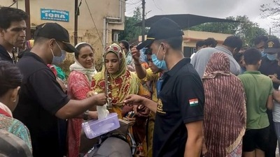 Indian Coast Guard conducts rescue and relief work in flood-hit areas of Maharashtra, Goa & Karnataka on Sunday. (ANI) Indian Coast Guard conducts rescue and relief work in flood-hit areas of Maharashtra, Goa & Karnataka on Sunday. (ANI)