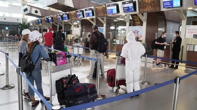 Several countries have announced new bans or restrictions on travelers from Indonesia, including neighboring Singapore and the Philippines. (Bloomberg) Several countries have announced new bans or restrictions on travelers from Indonesia, including neighboring Singapore and the Philippines. (Bloomberg)