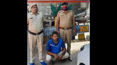 The accused driver, Chandan Bharti, along with the impounded truck bearing Amritsar registration number, in police custody in Ambala. (HT PHOTO) The accused driver, Chandan Bharti, along with the impounded truck bearing Amritsar registration number, in police custody in Ambala. (HT PHOTO)