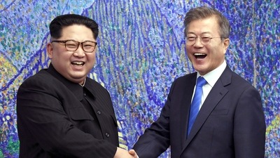 FILE - In this April 27, 2018, file photo, North Korean leader Kim Jong Un, left, poses with South Korean President Moon Jae-in for a photo inside the Peace House at the border village of Panmunjom in Demilitarized Zone, South Korea. The presidential office in Seoul said Tuesday, July 27, 2021, Moon and Kim have agreed to restore suspended communication channels and improve ties. (Korea Summit Press Pool via AP, File) (AP)