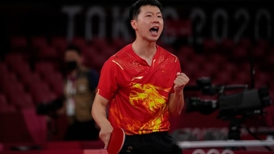 China's Ma Long reacts during the table tennis men's singles third round match against India's Achanta Kamal at the 2020 Summer Olympics, Tuesday, July 27, 2021, in Tokyo. (AP Photo/Kin Cheung) (AP) China's Ma Long reacts during the table tennis men's singles third round match against India's Achanta Kamal at the 2020 Summer Olympics, Tuesday, July 27, 2021, in Tokyo. (AP Photo/Kin Cheung) (AP)