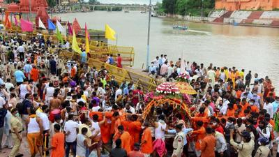 Devotees take part in sawari of Lord Mahakal on the first Monday of Sawan in Ujjain on July 26. (PTI)