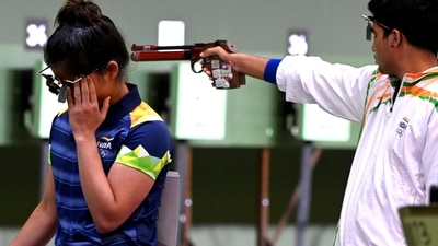 India's Manu Bhaker and Saurabh Chaudhary during the 10m Air Pistol Mixed Team shooting event Tokyo Olympics 2020 (PTI) India's Manu Bhaker and Saurabh Chaudhary during the 10m Air Pistol Mixed Team shooting event Tokyo Olympics 2020 (PTI)
