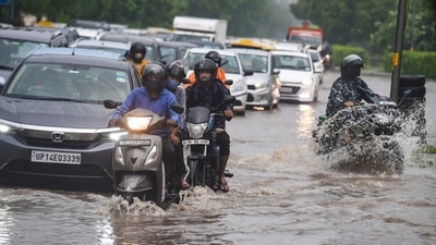 Vehicles move slowly on the waterlogged Ring Road on Tuesday morning in New Delhi. (PTI Photo/Atul Yadav) Vehicles move slowly on the waterlogged Ring Road on Tuesday morning in New Delhi. (PTI Photo/Atul Yadav)