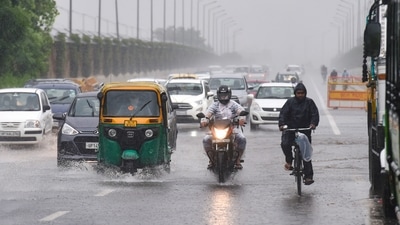 Vehicles ply on the NH 24 during monsoon rains in New Delhi on July, 27. The India Meteorological Department (IMD) has predicted a spell of rain of light intensity over isolated places of the national capital, Haryana, and Uttar Pradesh in the next two hours. (PTI) Vehicles ply on the NH 24 during monsoon rains in New Delhi on July, 27. The India Meteorological Department (IMD) has predicted a spell of rain of light intensity over isolated places of the national capital, Haryana, and Uttar Pradesh in the next two hours. (PTI)