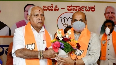 Karnataka chief minister to-be Basavaraj Bommai (R) with outgoing chief minister BS Yediyurappa (L) during the BJP legislature party meeting in Bengaluru, on Tuesday, July 27, 2021. (PTI) Karnataka chief minister to-be Basavaraj Bommai (R) with outgoing chief minister BS Yediyurappa (L) during the BJP legislature party meeting in Bengaluru, on Tuesday, July 27, 2021. (PTI)