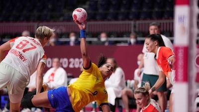 Brazil's Ana Paula Rodrigues Belo scores during the women's Preliminary Round Group B handball match between Brasil and Hungary at the 2020 Summer Olympics, Tuesday, July 27, 2021, in Tokyo, Japan. (AP Photo/Pavel Golovkin) (AP) Brazil's Ana Paula Rodrigues Belo scores during the women's Preliminary Round Group B handball match between Brasil and Hungary at the 2020 Summer Olympics, Tuesday, July 27, 2021, in Tokyo, Japan. (AP Photo/Pavel Golovkin) (AP)