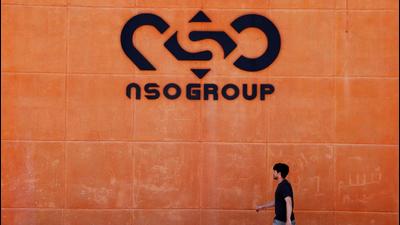 A man walks past the logo of Israeli cyber firm NSO Group at one of its branches in the Arava Desert, southern Israel. (REUTERS) A man walks past the logo of Israeli cyber firm NSO Group at one of its branches in the Arava Desert, southern Israel. (REUTERS)
