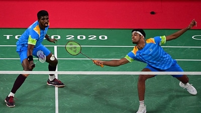 India's Chirag Shetty (R) hits a shot next to India's Satwiksairaj Rankireddy. (Getty Images) India's Chirag Shetty (R) hits a shot next to India's Satwiksairaj Rankireddy. (Getty Images)