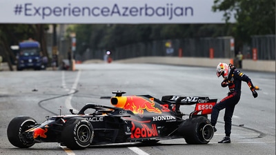 Max Verstappen of Red Bull Racing kicks his tyre as he reacts after crashing. (Getty Images) Max Verstappen of Red Bull Racing kicks his tyre as he reacts after crashing. (Getty Images)