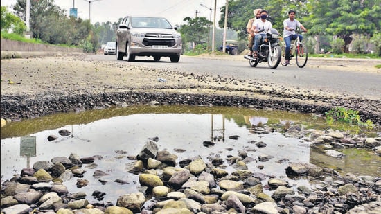 Roads in a dilapidated state at BRS Bypass Road in Ludhiana. (Gurpreet Singh/HT)