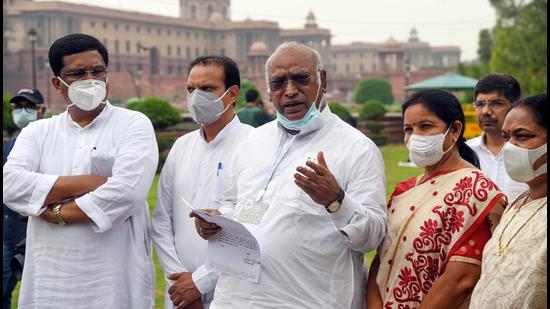 Leader of Opposition and Rajya Sabha MP Mallikarjun Kharge along with other MPs speak to media outside Parliament House at Vijay Chowk, in New Delhi. (ANI)
