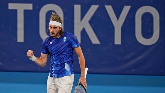 Stefanos Tsitsipas, of Greece, reacts after defeating Frances Tiafoe, of the United States, during the second round of the tennis competition at the 2020 Summer Olympics, Tuesday, July 27, 2021, in Tokyo, Japan.(AP)