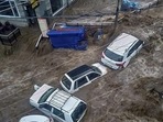 Vehicles trapped in flood water due to heavy rain after a cloudburst, at Mcleodganj near Dharamshala. (PTI) Vehicles trapped in flood water due to heavy rain after a cloudburst, at Mcleodganj near Dharamshala. (PTI)