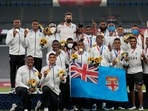 Fiji's team poses with their gold medals after winning men's rugby sevens at the 2020 Summer Olympics, Wednesday, July 28, 2021 in Tokyo, Japan. Fiji's team poses with their gold medals after winning men's rugby sevens at the 2020 Summer Olympics, Wednesday, July 28, 2021 in Tokyo, Japan.
