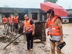 Samba: Three children of village Mananu Nud, rescued by SDRF team who trapped in flash flood adjoining to river Basanter in Samba district, Wednesday, 