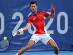 Novak Djokovic in action against Alejandro Davidovich Fokina. 