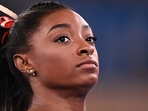USA's Simone Biles looks on. 