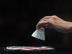 Legendary badminton player Nandu Natekar passed away (representational image of a shuttle being placed on a racket)(Getty Images)