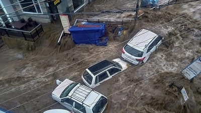 Vehicles trapped in flood water due to heavy rain after a cloudburst, at Mcleodganj near Dharamshala. (PTI) Vehicles trapped in flood water due to heavy rain after a cloudburst, at Mcleodganj near Dharamshala. (PTI)
