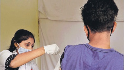 A beneficiary gets a jab at a vaccination centre in Pune, on July 27. Pune city’s 2021 death count is double of 2020 due to Covid cases. (PRATHAM GOGHALE/HT) A beneficiary gets a jab at a vaccination centre in Pune, on July 27. Pune city’s 2021 death count is double of 2020 due to Covid cases. (PRATHAM GOGHALE/HT)