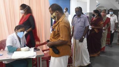 Beneficiaries wait for their dose of Covid-19 vaccine in Kochi on July 24. (PTI)