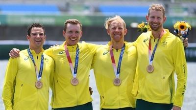 Tokyo 2020 Olympics - Rowing - Men's Quadruple Sculls - Medal Ceremony - Sea Forest Waterway, Tokyo, Japan - July 28, 2021. Bronze medallists Jack Cleary of Australia, Caleb Antill of Australia, Cameron Girdlestone of Australia and Luke Letcher of Australia celebrate with their medals REUTERS/Piroschka Van De Wouw (REUTERS)