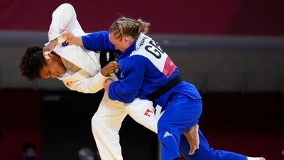 Maria Perez of Puerto Rico, left, and Gemma Howell of Britain compete during the women -70kg elimination round of the judo match at the 2020 Summer Olympics in Tokyo, Japan, Wednesday, July 28, 2021. (AP Photo/Vincent Thian) (AP) Maria Perez of Puerto Rico, left, and Gemma Howell of Britain compete during the women -70kg elimination round of the judo match at the 2020 Summer Olympics in Tokyo, Japan, Wednesday, July 28, 2021. (AP Photo/Vincent Thian) (AP)