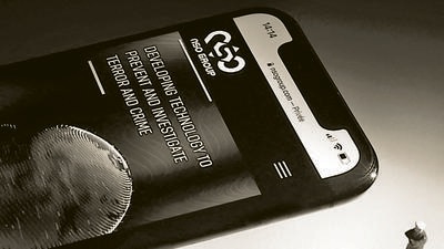 A smartphone with the website of Israel's NSO Group which features 'Pegasus' surveillanceware. (AFP)