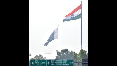 National flags of India and Pakistan fluttering on both side of the International Border at Attari near Amritsar. National flags of India and Pakistan fluttering on both side of the International Border at Attari near Amritsar.