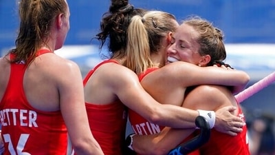 Britain's Hannah Martin, center right, celebreates with Shona McCallin, right, after scoring on India goalkeeper Savita during a women's field hockey match at the 2020 Summer Olympics, Wednesday, July 28, 2021, in Tokyo, Japan. (AP Photo/John Minchillo) (AP) Britain's Hannah Martin, center right, celebreates with Shona McCallin, right, after scoring on India goalkeeper Savita during a women's field hockey match at the 2020 Summer Olympics, Wednesday, July 28, 2021, in Tokyo, Japan. (AP Photo/John Minchillo) (AP)