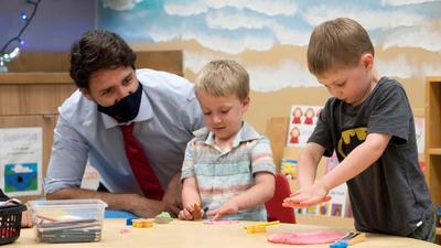 Children play as Canada's Prime Minister Justin Trudeau watches at Carrefour de l'Isle-Saint-Jean school in Charlottetown, Prince Edward Island, Canada on July 27, 2021. (REUTERS) Children play as Canada's Prime Minister Justin Trudeau watches at Carrefour de l'Isle-Saint-Jean school in Charlottetown, Prince Edward Island, Canada on July 27, 2021. (REUTERS)