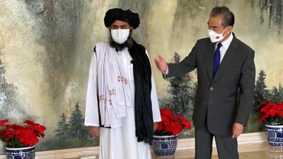 Several images of Wang Yi with the Taliban delegation, which included spokesman Suhail Shaheen, were posted on social media. (Sourced) Several images of Wang Yi with the Taliban delegation, which included spokesman Suhail Shaheen, were posted on social media. (Sourced)