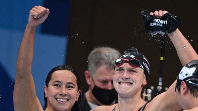 First placed USA's Kathleen Ledecky (R) and second places USA's Erica Sullivan celebrate after the final of the women's 1500m freestyle swimming event during the Tokyo 2020 Olympic Games at the Tokyo Aquatics Centre in Tokyo on July 28, 2021. (Photo by Oli SCARFF / AFP) (AFP) First placed USA's Kathleen Ledecky (R) and second places USA's Erica Sullivan celebrate after the final of the women's 1500m freestyle swimming event during the Tokyo 2020 Olympic Games at the Tokyo Aquatics Centre in Tokyo on July 28, 2021. (Photo by Oli SCARFF / AFP) (AFP)