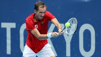 Russia's Daniil Medvedev returns the ball to Italy's Fabio Fognini during their Tokyo 2020 Olympic Games men's singles third round tennis match at the Ariake Tennis Park in Tokyo on July 28, 2021 (AFP) Russia's Daniil Medvedev returns the ball to Italy's Fabio Fognini during their Tokyo 2020 Olympic Games men's singles third round tennis match at the Ariake Tennis Park in Tokyo on July 28, 2021 (AFP)