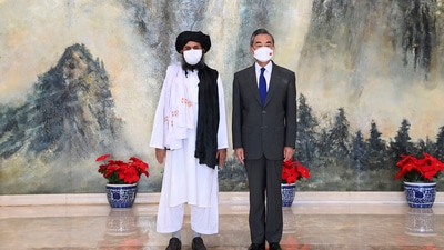 Taliban co-founder Mullah Abdul Ghani Baradar, left, and Chinese Foreign Minister Wang Yi pose for a photo during their meeting in Tianjin, China. (AP) Taliban co-founder Mullah Abdul Ghani Baradar, left, and Chinese Foreign Minister Wang Yi pose for a photo during their meeting in Tianjin, China. (AP)