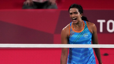 Pusarla V. Sindhu reacts after winning a point against Hong Kong China's Ngan Yi Cheung, in the women's singles badminton match at the Summer Olympics 2020. (PTI) Pusarla V. Sindhu reacts after winning a point against Hong Kong China's Ngan Yi Cheung, in the women's singles badminton match at the Summer Olympics 2020. (PTI)