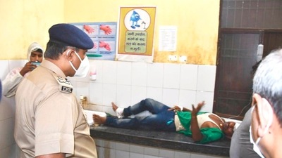 ADG (Lucknow Zone) SN Sabat visits the injured victims at a hospital after a speedy truck hit a stationary passenger bus in Barabanki, late on Tuesday. (PTI Photo) ADG (Lucknow Zone) SN Sabat visits the injured victims at a hospital after a speedy truck hit a stationary passenger bus in Barabanki, late on Tuesday. (PTI Photo)