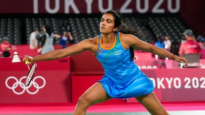 Tokyo: India's Pusarla V. Sindhu plays against Hong Kong China's Ngan Yi Cheung in the women�s singles badminton match, at the Summer Olympics 2020, in Tokyo, Wednesday, July 28, 2021. Sindhu won the match 21-9, 21-16. (PTI Photo/Gurinder Osan) (PTI07_28_2021_000122B) (PTI) Tokyo: India's Pusarla V. Sindhu plays against Hong Kong China's Ngan Yi Cheung in the women�s singles badminton match, at the Summer Olympics 2020, in Tokyo, Wednesday, July 28, 2021. Sindhu won the match 21-9, 21-16. (PTI Photo/Gurinder Osan) (PTI07_28_2021_000122B) (PTI)