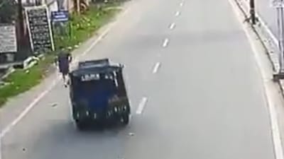 Dhanbad additional sessions and district judge Uttam Anand was jogging along the road early on Wednesday when the three-wheeler hit him (CCTV grab/@Join_AmitSingh) Dhanbad additional sessions and district judge Uttam Anand was jogging along the road early on Wednesday when the three-wheeler hit him (CCTV grab/@Join_AmitSingh)